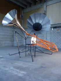 Alberto Tadiello, LK100A, 2010. metallic structure, electrical motor, manual siren, cabling. Courtesy T293, Naples